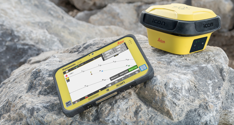 Leica iCON GPS 70 ja Leica iCON CC80 -maastotallennin Leica iCON site -ohjelmiston kanssa kivien päällä.